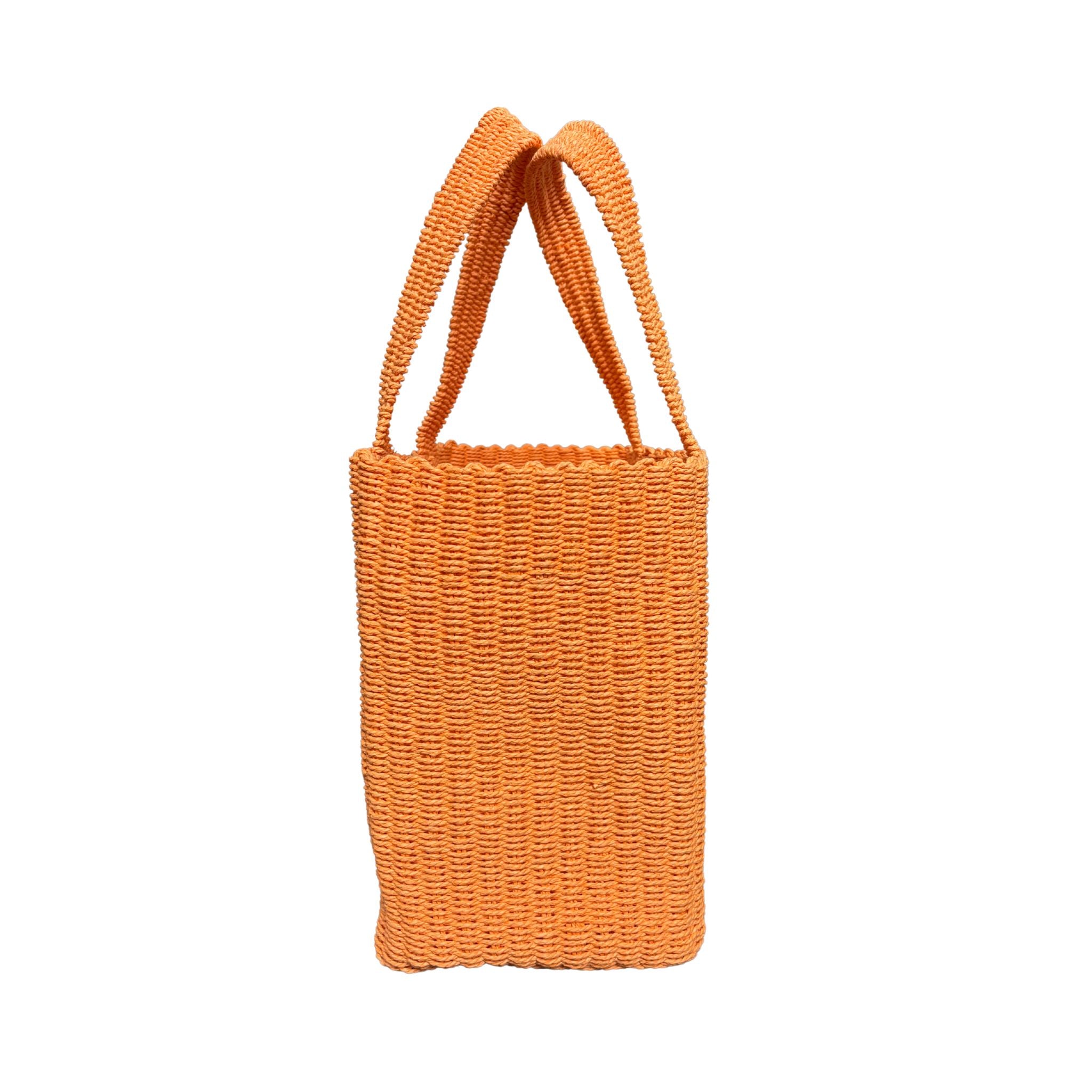 Orange Raffia Woven bag with handle on a white background