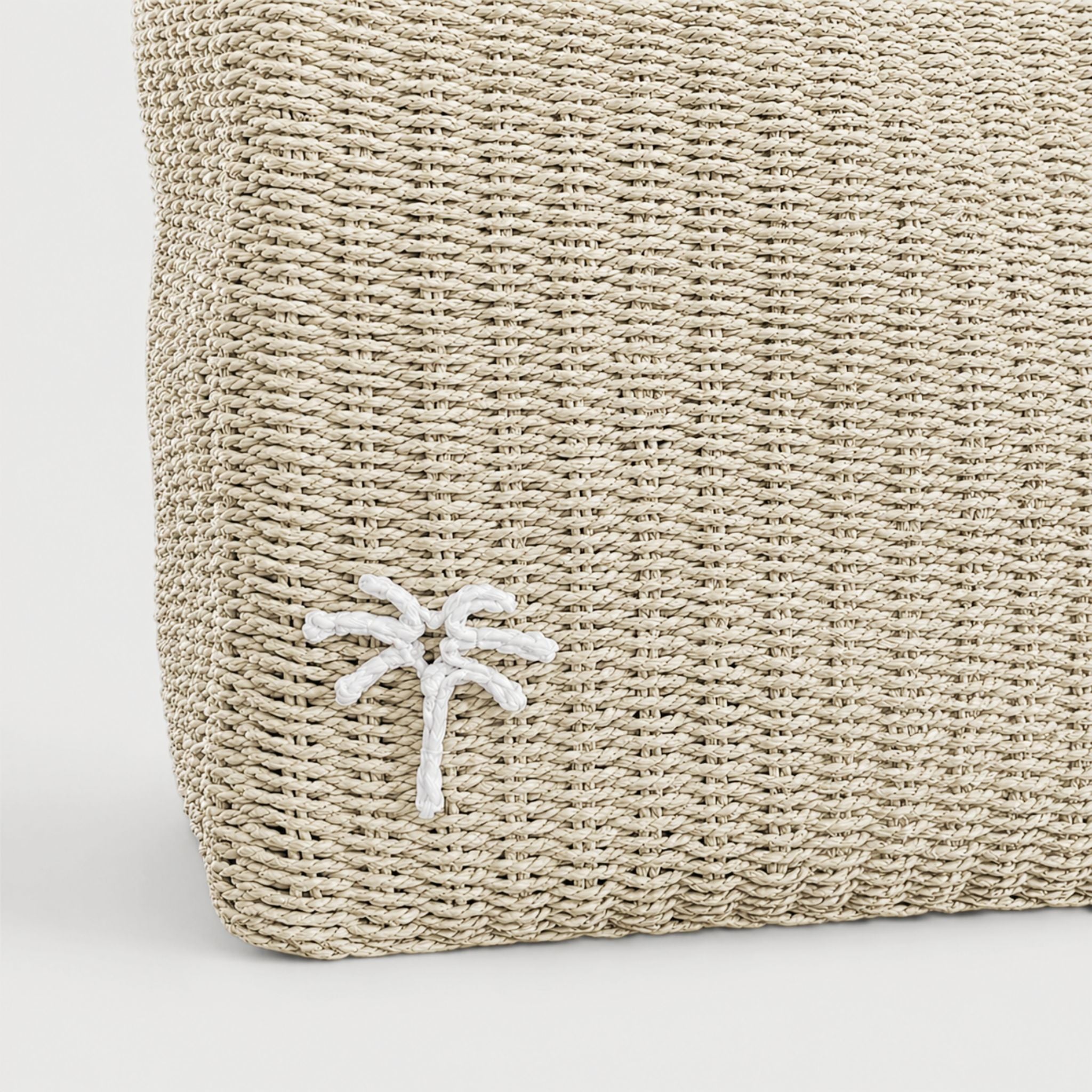 Natural woven tote bag, front view with palm tree raffia detail