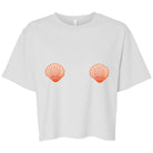 White cropped t-shirt with two orange seashell graphics positioned on the chest area, displayed on a clean white background.