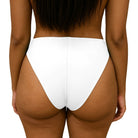 White Cheek Peek Bikini Bottom worn by a person on a white background