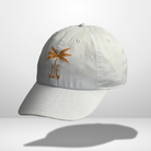 White JE Swim baseball cap with orange palm tree logo.

