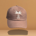 Brown JE Swim baseball hat featuring a white palm tree logo and JE Swim branding.