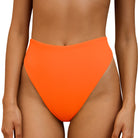 front of Orange bikini bottom on a white background