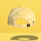 Yellow JE Swim baseball cap with adjustable strap and no visible text.